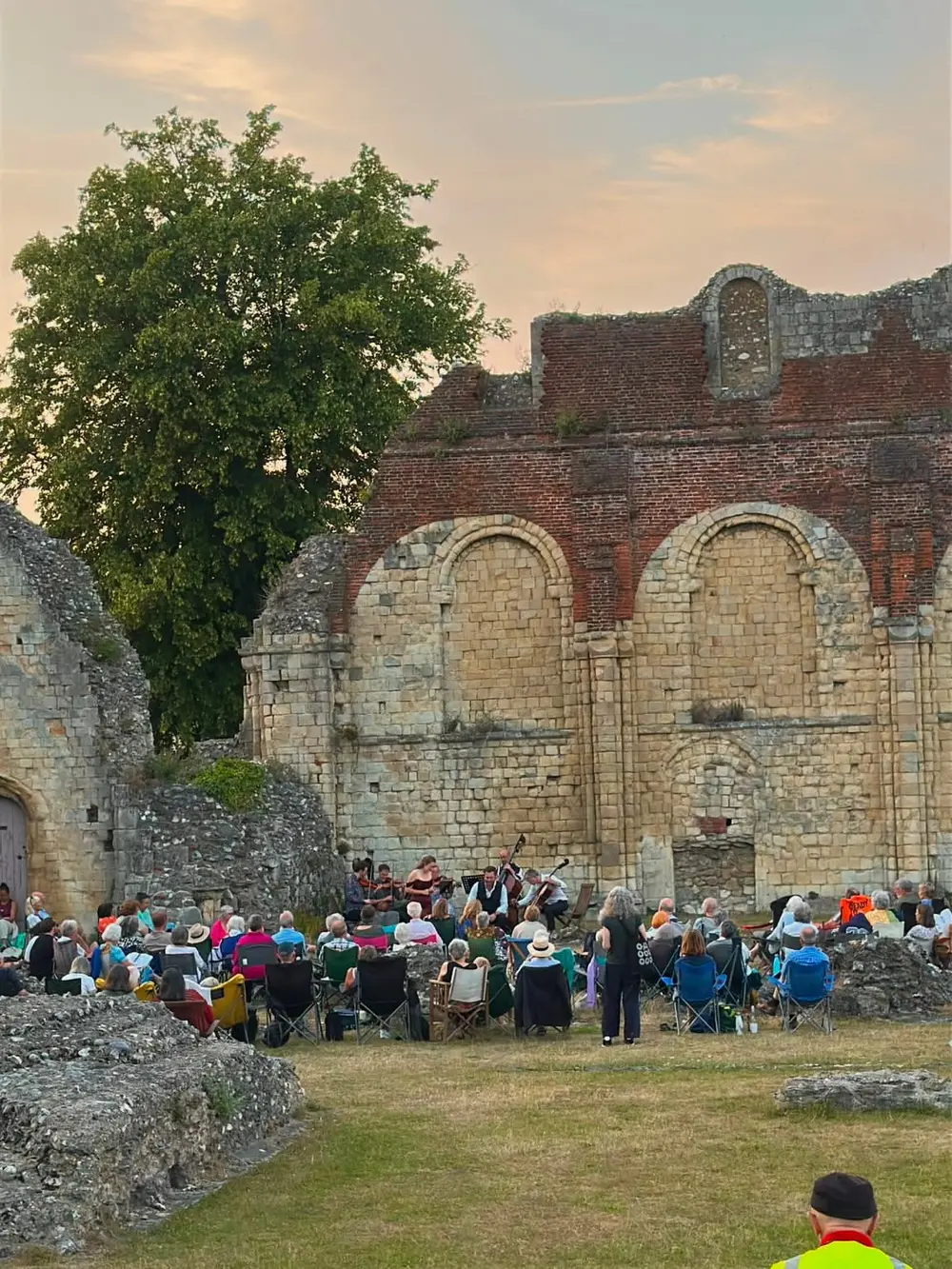 An outdoor performance among the historic ruins at St Augustine’s Abbey